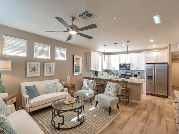 Living Room & Kitchen (Corporate Apartment) at Bella Victoria Apartments In Mesa, AZ